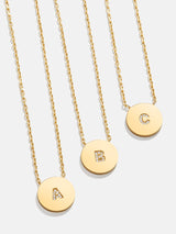 BaubleBar 18K Gold Single Initial Custom Disc Necklace - 
    18K Gold Plated Sterling Silver, Cubic Zirconia stones
  
