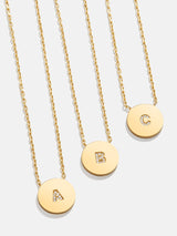 BaubleBar 18K Gold Single Initial Custom Disc Necklace - Clear/Gold - 
    18K Gold Plated Sterling Silver, Cubic Zirconia stones
  
