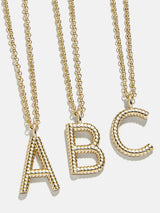BaubleBar Classic Initial Necklace - Ribbed Initial - 
    Ribbed gold initial necklace
  

