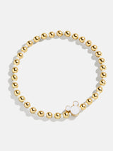 BaubleBar White - Disney gold beaded stretch bracelet