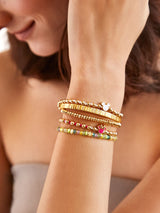 BaubleBar White - Disney gold beaded stretch bracelet