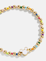 BaubleBar Multi - Disney gold beaded stretch bracelet