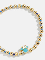 BaubleBar Blue Ombre - Disney gold beaded stretch bracelet