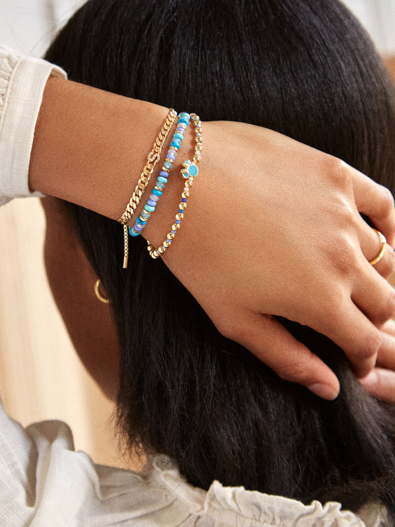 BaubleBar Blue Ombre - Disney gold beaded stretch bracelet