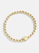 BaubleBar White - Disney gold beaded stretch bracelet