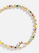BaubleBar Multi - Disney gold beaded stretch bracelet