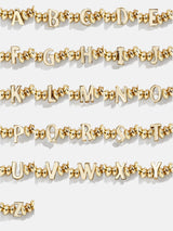 BaubleBar Initial Paris Bracelet - Gold - Gold beaded stretch bracelet