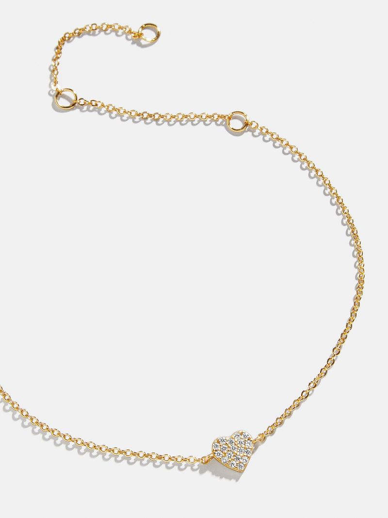 BaubleBar 18K Gold Heart Bracelet - Pavé Heart - 
    18K Gold Plated Sterling Silver, Cubic Zirconia stones
  
