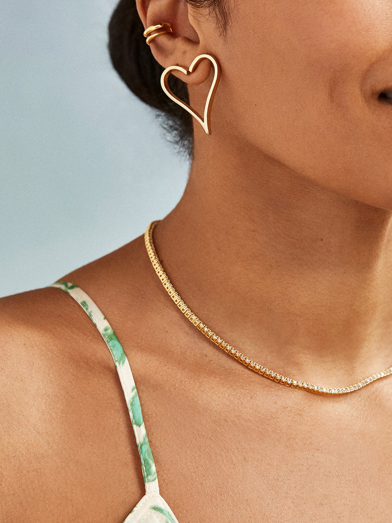 BaubleBar Amanda Earrings - Asymmetrical heart stud earrings