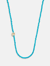 BaubleBar D - Asymmetrical beaded initial necklace