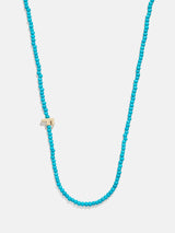 BaubleBar F - Asymmetrical beaded initial necklace