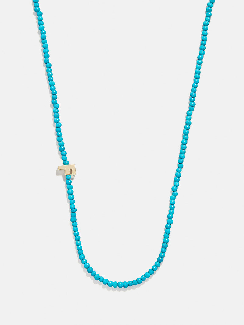 BaubleBar F - Asymmetrical beaded initial necklace