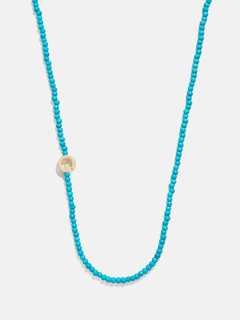 BaubleBar G - Asymmetrical beaded initial necklace