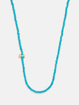 BaubleBar J - Asymmetrical beaded initial necklace