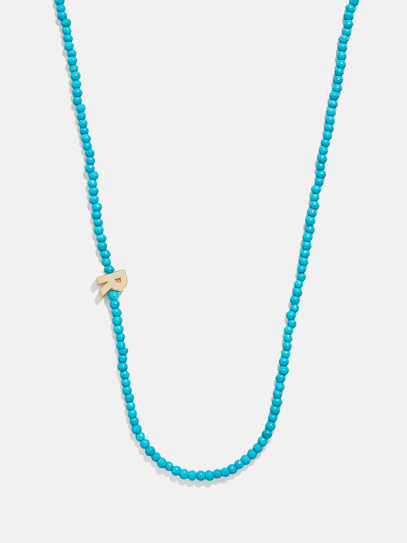 BaubleBar R - 
    Asymmetrical beaded initial necklace
  
