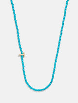 BaubleBar T - 
    Asymmetrical beaded initial necklace
  
