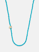 BaubleBar U - 
    Asymmetrical beaded initial necklace
  
