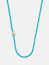BaubleBar W - 
    Asymmetrical beaded initial necklace
  
