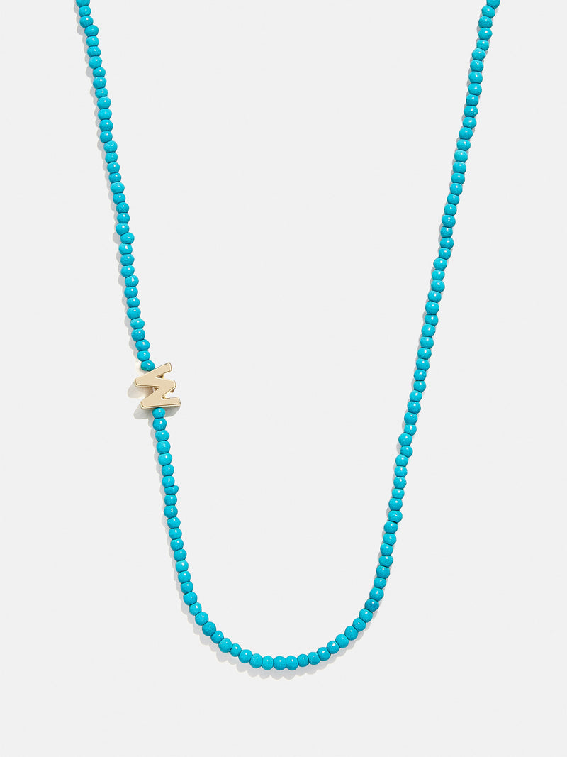 BaubleBar W - Asymmetrical beaded initial necklace