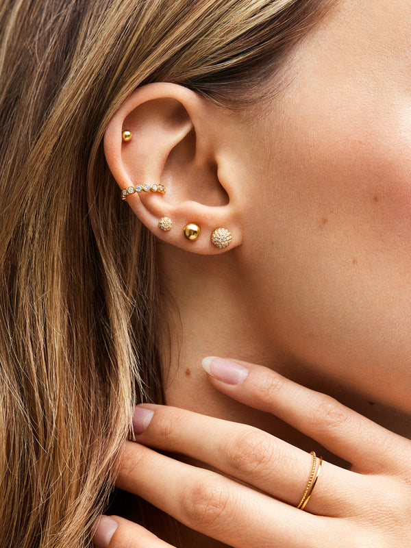 Ear piercing by Megan