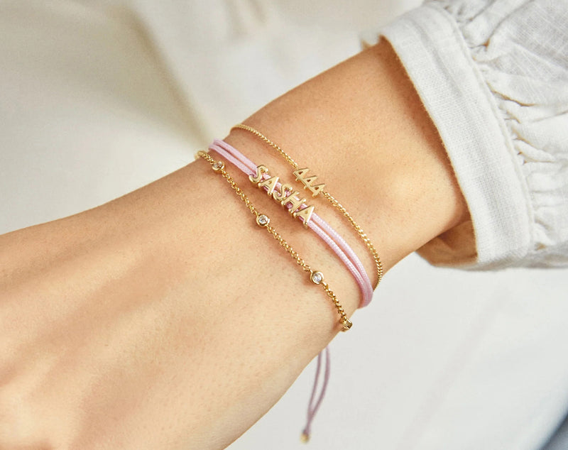 BaubleBar Custom Cord Bracelet - Soft Pink - 
    Custom nameplate bracelet
  
