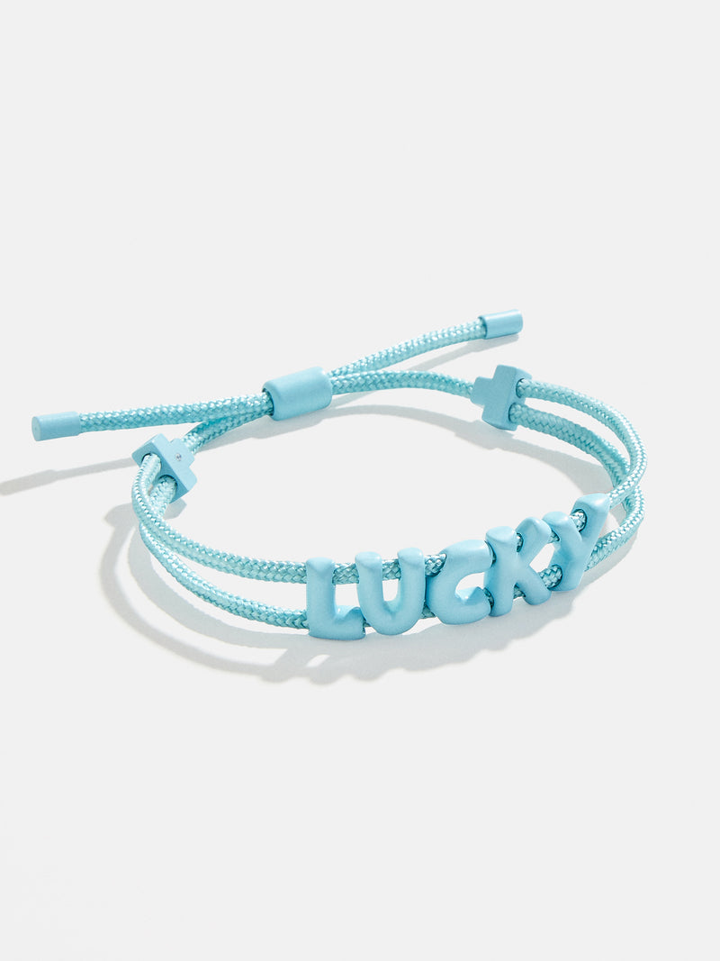 BaubleBar Lucky - Adjustable pull-tie bracelet - 19 different phrases available