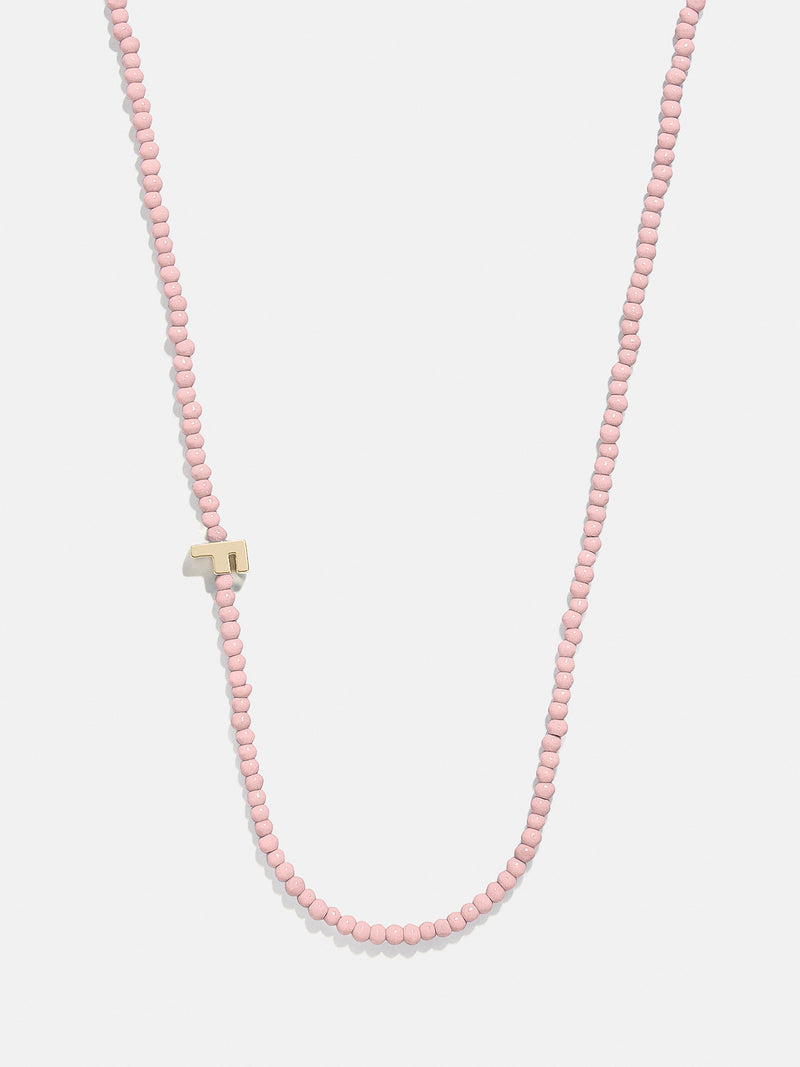 BaubleBar F - 
    Asymmetrical beaded initial necklace
  
