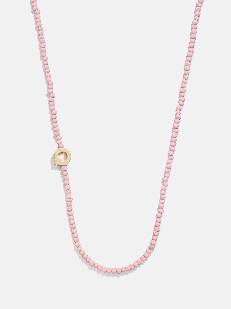 BaubleBar Q - 
    Asymmetrical beaded initial necklace
  
