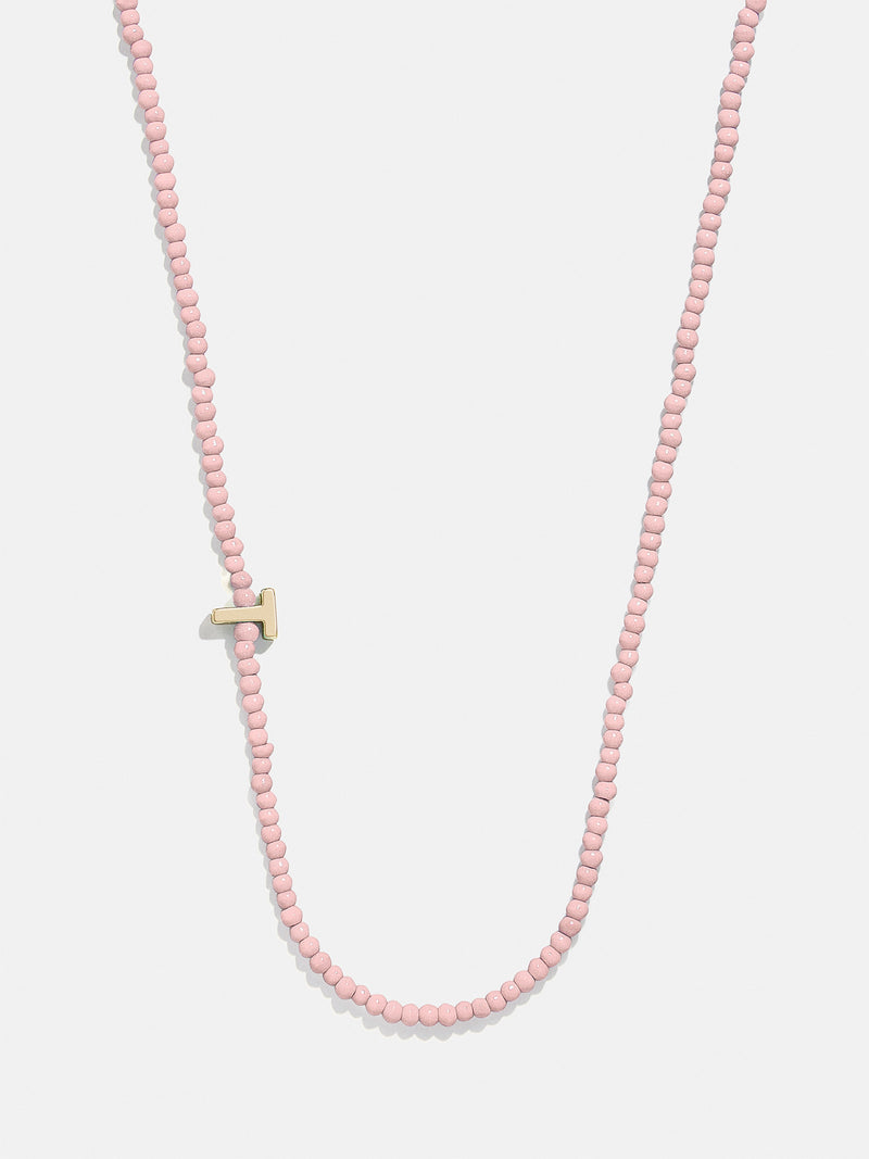 BaubleBar T - 
    Asymmetrical beaded initial necklace
  
