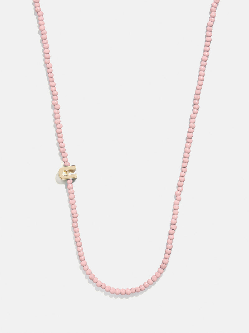 BaubleBar U - 
    Asymmetrical beaded initial necklace
  
