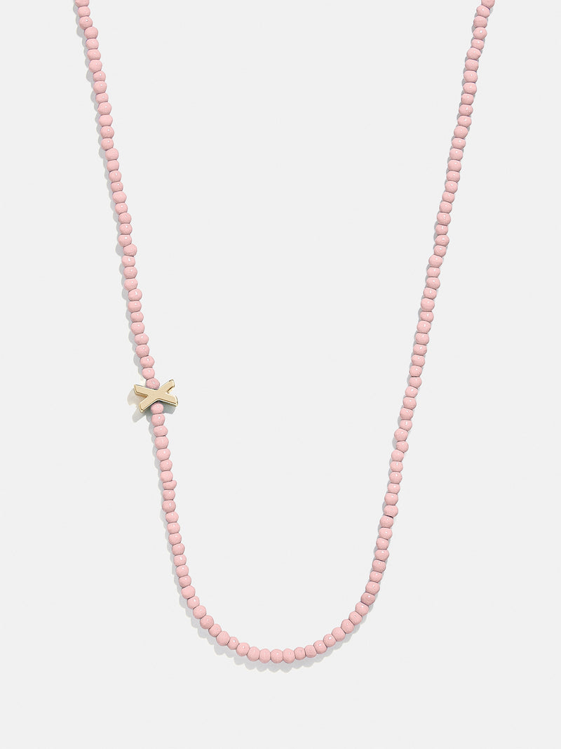 BaubleBar X - 
    Asymmetrical beaded initial necklace
  
