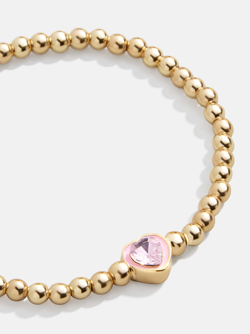 BaubleBar Pink - 
    Gold beaded stretch bracelet
  
