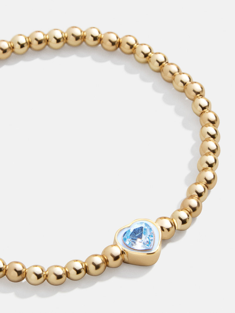 BaubleBar Light Blue - 
    Gold beaded stretch bracelet
  
