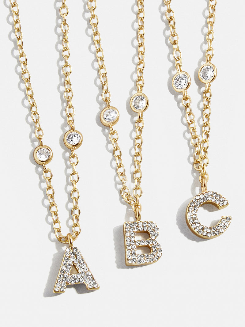 BaubleBar Pavé Initial Yasmine Necklace - Clear/Gold - 
    Initial necklace
  
