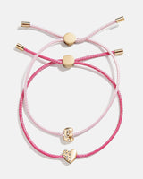 BaubleBar E - 
    Two cord pull-tie bracelets
  
