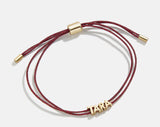 BaubleBar Custom Cord Bracelet - Metallic Red - 
    Custom nameplate bracelet
  
