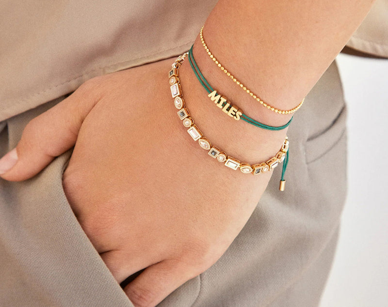 BaubleBar Custom Cord Bracelet - Dark Green - 
    Custom nameplate bracelet
  
