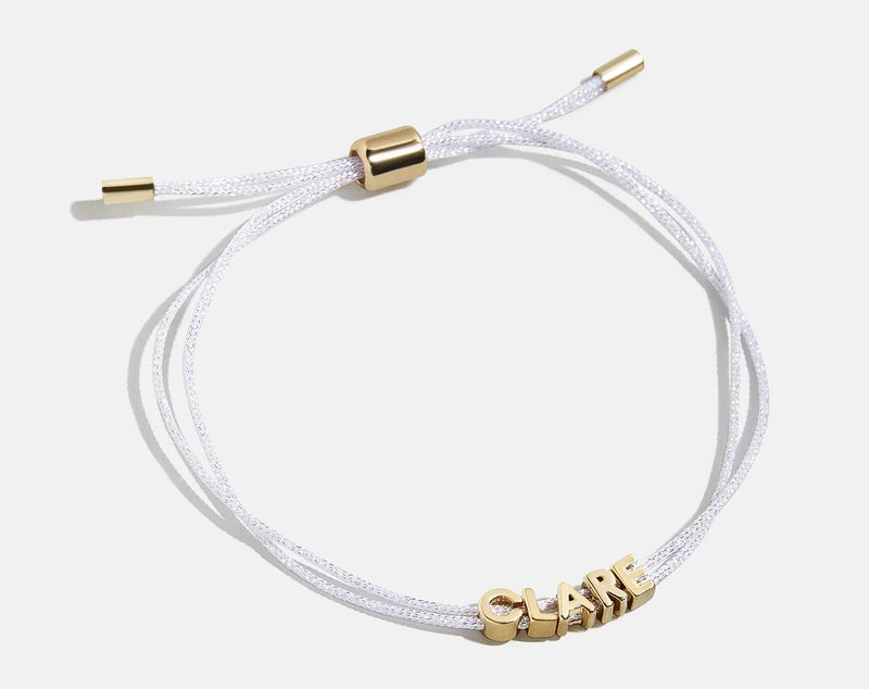BaubleBar Custom Cord Bracelet - White - 
    Custom nameplate bracelet
  
