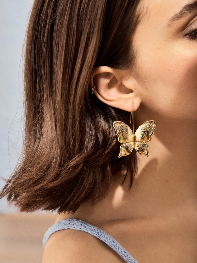 BaubleBar Flutter Away Earrings - Gold - 
    Gold butterfly drop earrings
  
