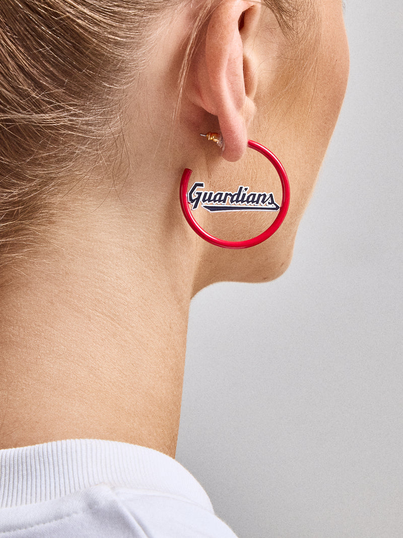 BaubleBar MLB Enamel Hoops - Cleveland Guardians - 
    20% Off MLB Styles. For one week only.
  
