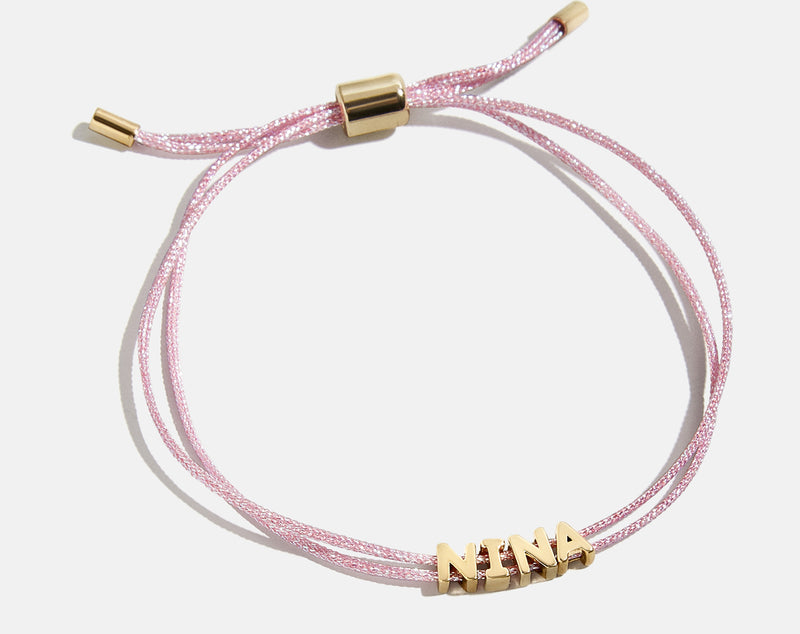 BaubleBar Custom Cord Bracelet - Metallic Pink - 
    Custom nameplate bracelet
  
