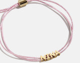 BaubleBar Custom Cord Bracelet - Metallic Pink - 
    Custom nameplate bracelet
  
