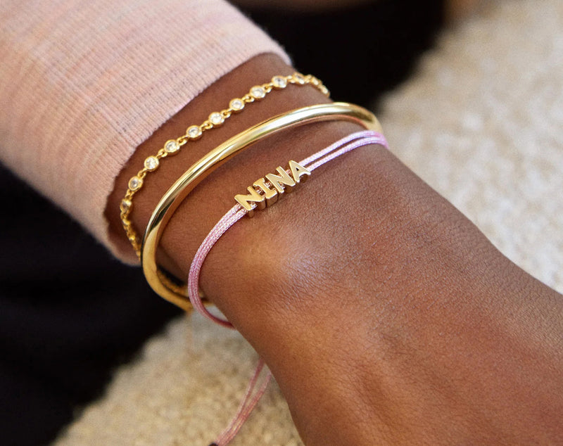 BaubleBar Custom Cord Bracelet - Metallic Pink - 
    Custom nameplate bracelet
  
