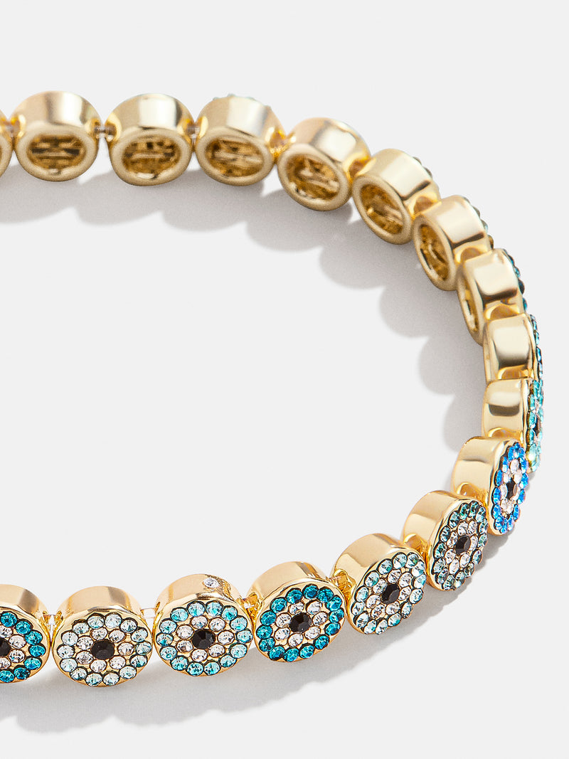 BaubleBar Kaya Bracelet - Blue - 
    Gold evil eye stretch bracelet
  
