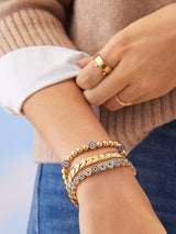 BaubleBar Kaya Bracelet - Blue - 
    Gold evil eye stretch bracelet
  
