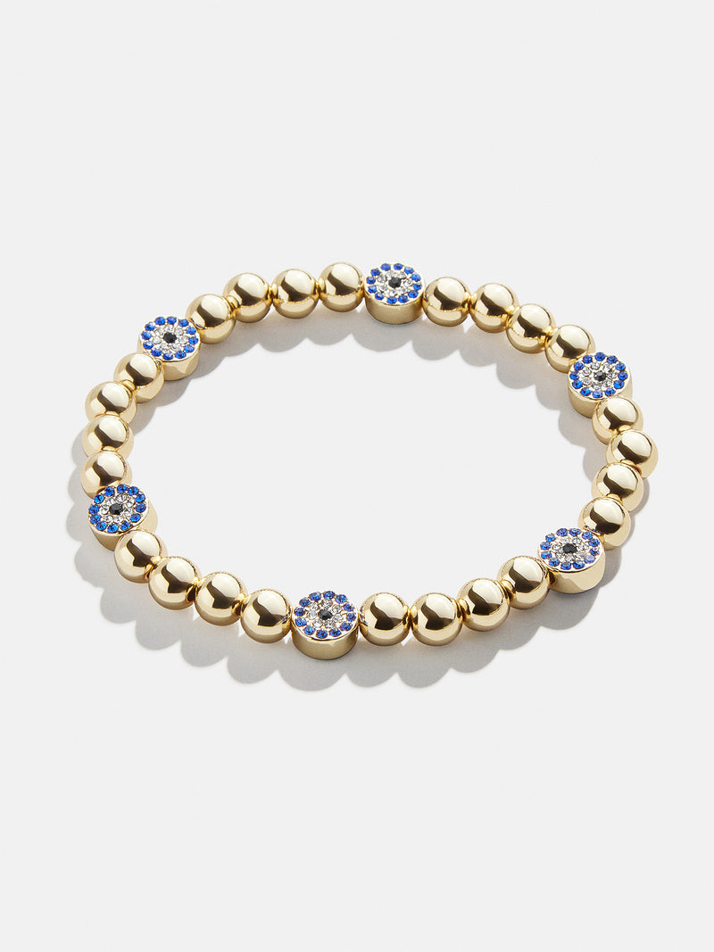 BaubleBar Isabella Bracelet - Blue/Gold - 
    Gold evil eye stretch bracelet
  
