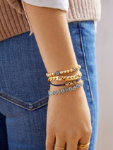 BaubleBar Isabella Bracelet - Blue/Gold - 
    Gold evil eye stretch bracelet
  
