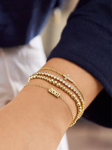 BaubleBar Milan Pisa Bracelet - Three Large Pisa Beads - 
    Gold beaded stretch bracelet
  
