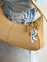 BaubleBar Disney Frozen Olaf Bag Charm - White - 
    Disney keychain
  
