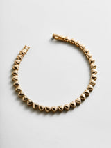 BaubleBar Kali Tennis Bracelet - Gold - 
    Gold repeating heart tennis bracelet
  
